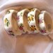 Sanford bone china napkin rings, Made in England, Cottage chic, white with yellow, pink, blue, green flowers, set of four