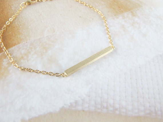 slim long gold bar bracelet