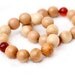 Two spring summer juniper wood elastic bracelets with  plastic and wood beads