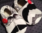 Mister Mustache Booties. Available in sizes 0-18mo.