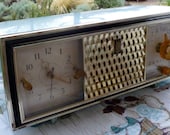 Wonderful antique working clock radio, Zenith Model C520, powder blue case, alarm clock/AM, gold tone metal design, mid century modern