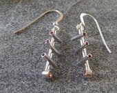 Opposites - emerald and sapphire earrings