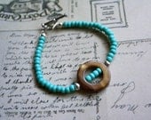 Czech Glass Blue Turquoise Bracelet with Gold Plated Heart Clasp and Round Brown Circle Center