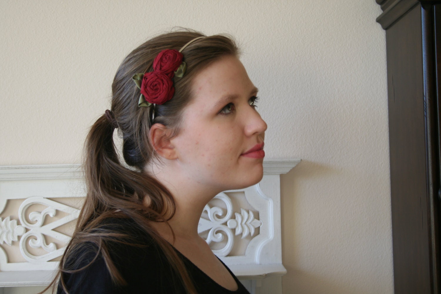 Fabric flower headband // Red hand made silk roses with green silk leaves on a silver metal headband.