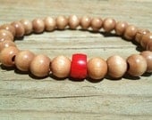 Red coral bracelet with wood beads