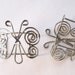 Silvertone Arm Cuffs Filigree Butterfly