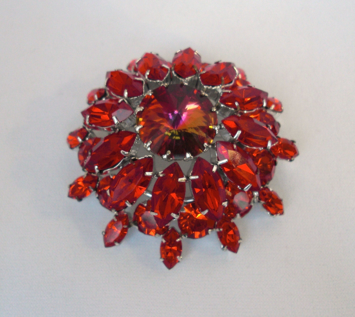 Dazzling Vintage fiery red Marquise cut rhinestone wreath style brooch with signature oversized Aurora Borealis rhinestone