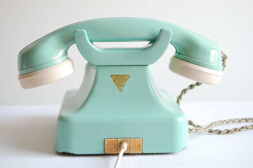 Aqua mint green vintage rotary telephone.