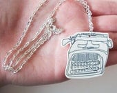 Typewriter linear plastic necklace. indie vintage typography design. illustrated jewellery shrink plastic.