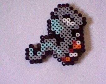The Legend of Zelda Snake perler bead creation....melted beads with magnet on back