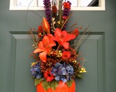 Thanksgiving.Hanging Wall or Front Door, pumpkin WREATH, Glossy Dark Orange Pumpkin, Dark Orange Lillies, Liatris and assorted Fall grasses