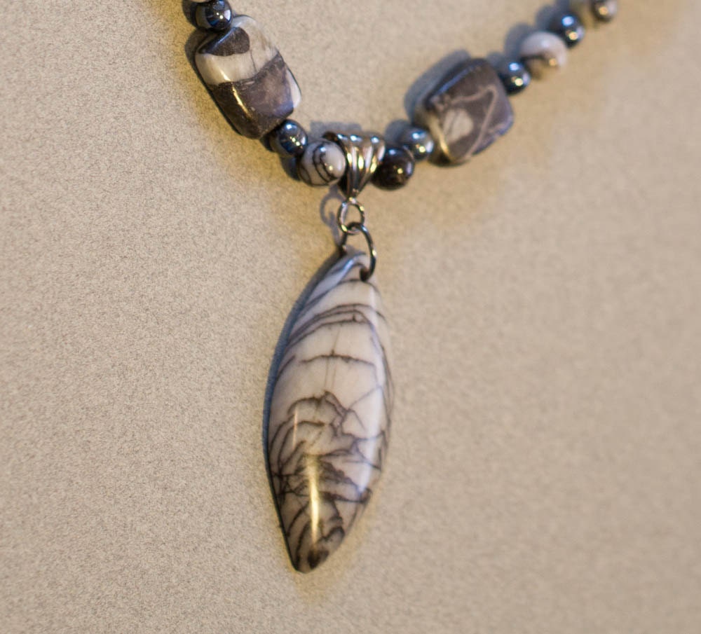 Marble and gunmetal, black and white: One of a kind beaded necklace with pendant