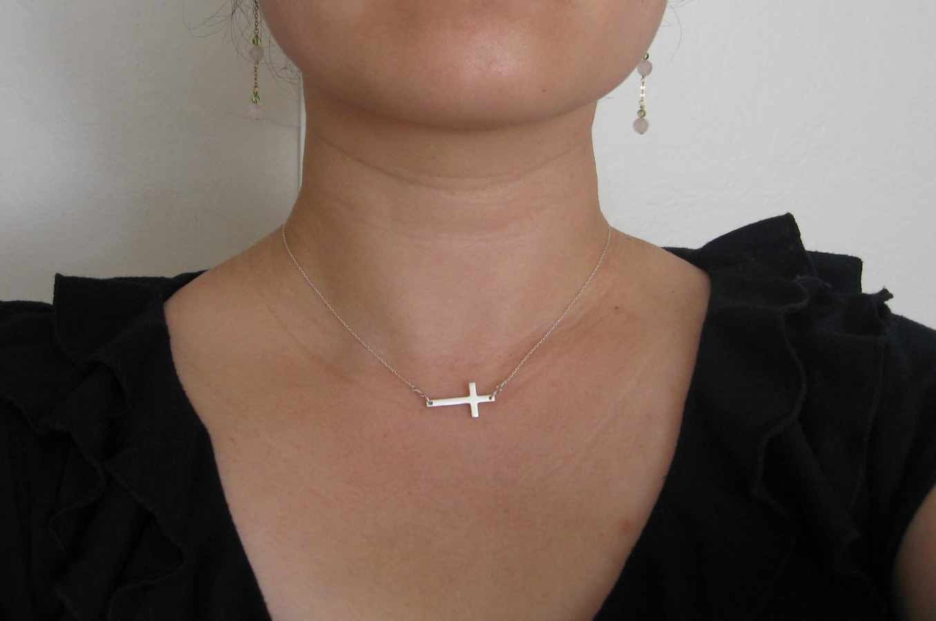 Sterling silver sideways cross necklace to benefit children's charity