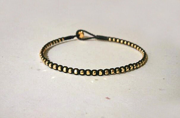 dainty faceted gold nugget wrap bracelet - bead button closure. max.