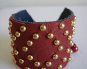 gold studded diamond pattern red and navy leather cuff charm bracelet (Joan of Arc Bracelet: brick red & navy)