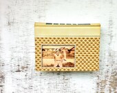 vintage book picture frame.  READABLE vintage book as unique photo frame.  Reader's Digest, 1967. ochre tan ivory pattern scales feathers
