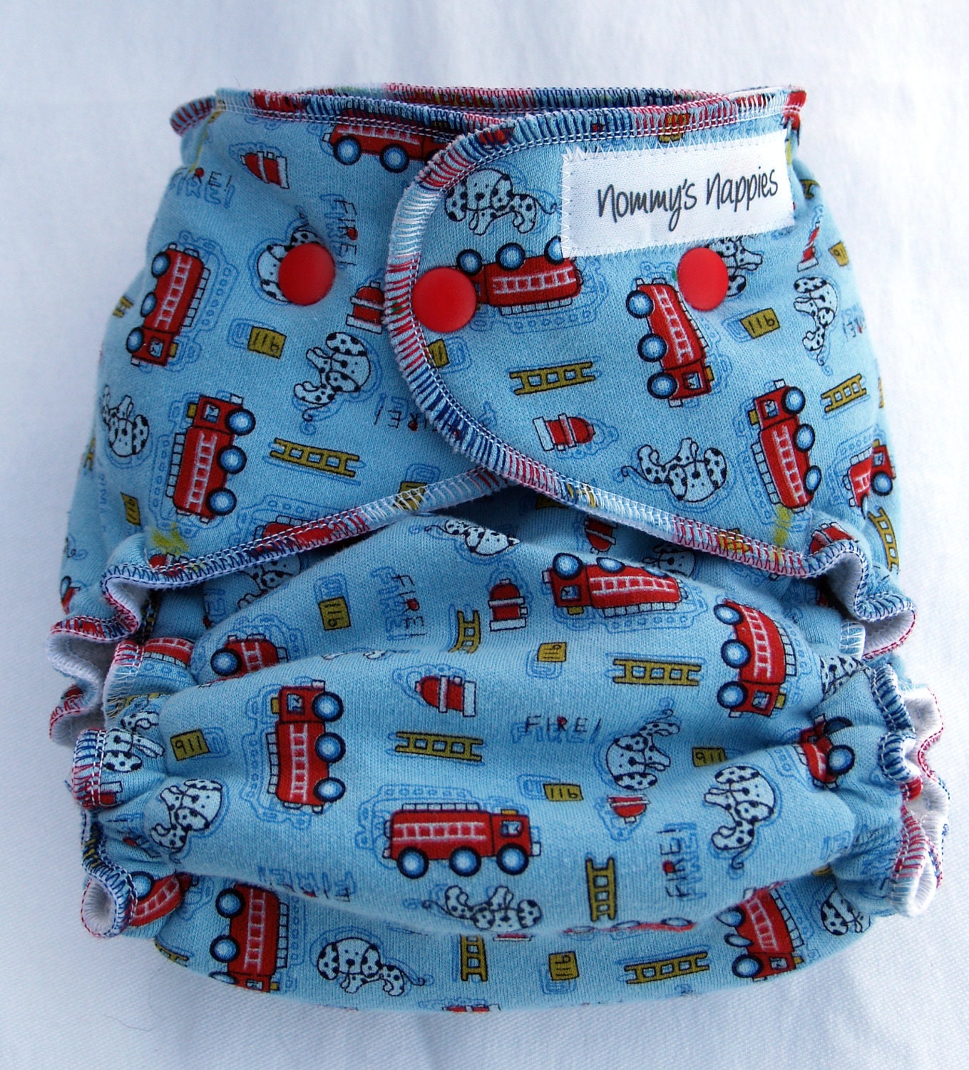 Nommy's Nighttime Hybrid Fitted Pocket Nappy - Red firetrucks & dalmatians on blue