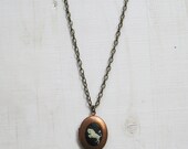 taurus // vintage copper locket necklace.