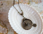 Large antique brass Penny farthing Big wheel bicycle necklace - vintage Portland