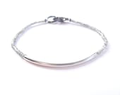 SALE // heartlines w silver bar in grey // dainty bracelet with cylindrical curved silver bar and matte grey seed beads