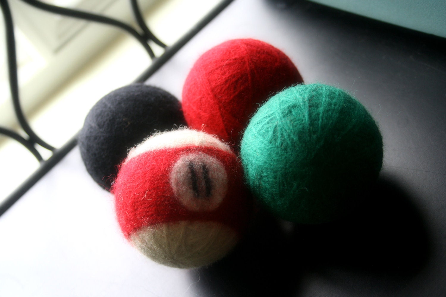 Wool felted dryer balls ... set of 4... Festive holiday colors with one billiard ball ... Ready to ship