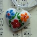 Folk, White, Glass, flowers, red blue orange green, love heart, pendant , necklace, by NewellsJewels on etsy