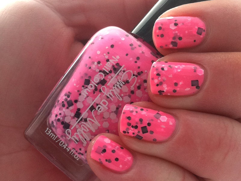 Nail polish - "Flurocious" black and white glitter in a neon pink base
