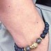 Black Lava and Pyrite gemstones Beaded Bracelet with Gold Buddha Bead for MEN