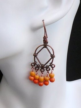 Antiqued copper chandelier earrings with orange and tangerine wood beads - Free shipping to Canada & USA