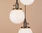 Triple Light Chandelier - Cascading Pendant Lights - 6 inch White Milk Glass Globes - Antique Reproduction Wire - Oil Rubbed Bronze Finish
