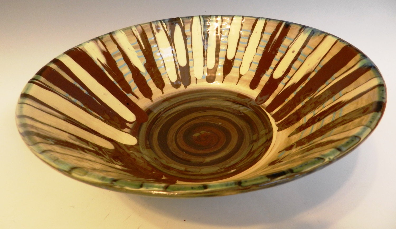 Ceramic tiki bowl with blue azure crystal glaze