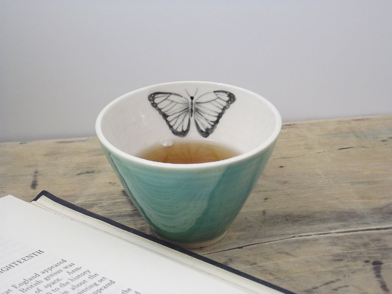 One Porcelain Teal Blue Morpho Butterfly Tea Cup - FaithAdamsCeramics