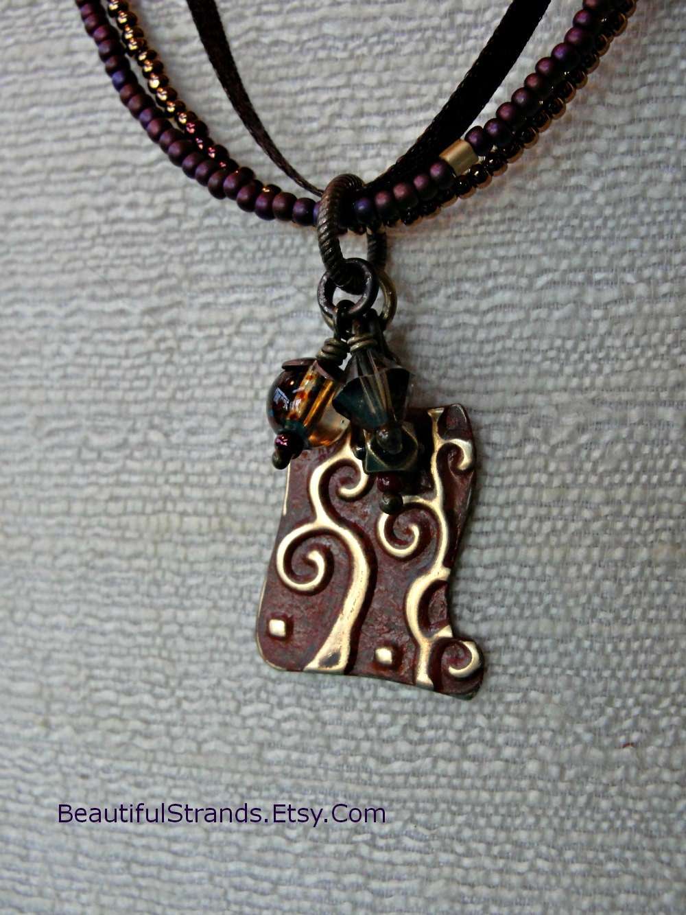 Painted and Embossed Brass Scroll Pendent on Multi-Strand Necklace, One of a Kind