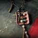 Leather and bead amulet necklace - tribal glass beads, gold coral and raw sapphire