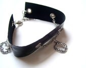 Black punk, gothic cuff, bracelet with vampire fangs.