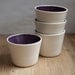 4 White Porcelain bowls with brushed purple glaze