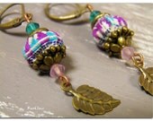 Ethnic chic earrings with pink and blue crystal beads-blue and mauve fabric beads-