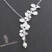 SALE, 10% OFF: Asymmetrical flowers cascade necklace in white gold, flower necklace, lariat necklace, wedding jewelry, bridesmaid