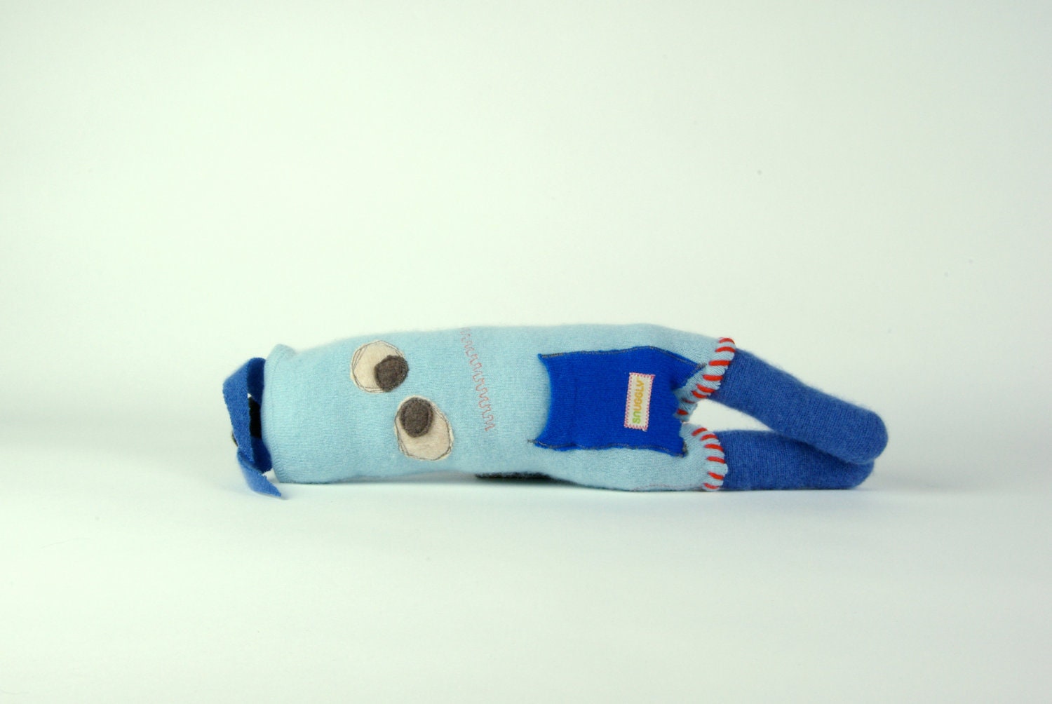 Snuggly munchkins, Blue & off white cashmere monster.