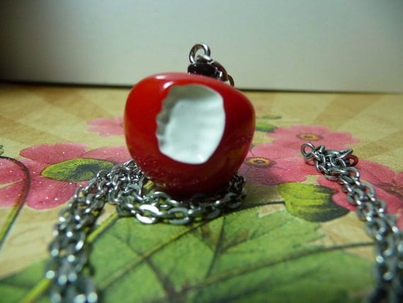 Snow White's Bitten Apple necklace by vintagerust