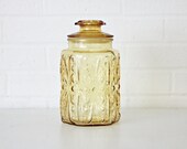 Vintage light Yellow glass canister with suction seal and decorative design 6 sided shape apocrathy jar - HelloCasoVintage