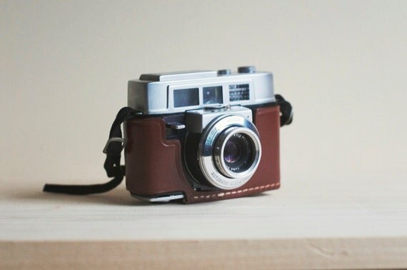 vintage 35mm film camera with beautiful leather case. kodak automatic 35f.