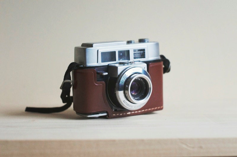 vintage 35mm film camera with beautiful leather case. kodak automatic 35f.