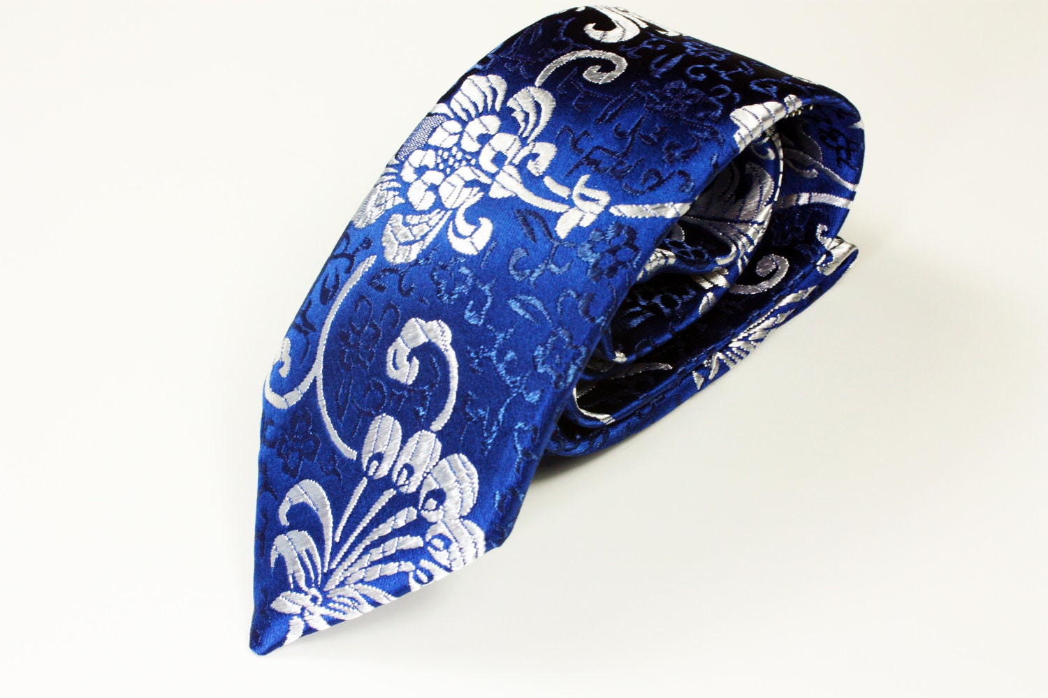 Woman's Necktie with Royal Blue and Silver Peony Scroll Brocade Fabric - TiedToHer