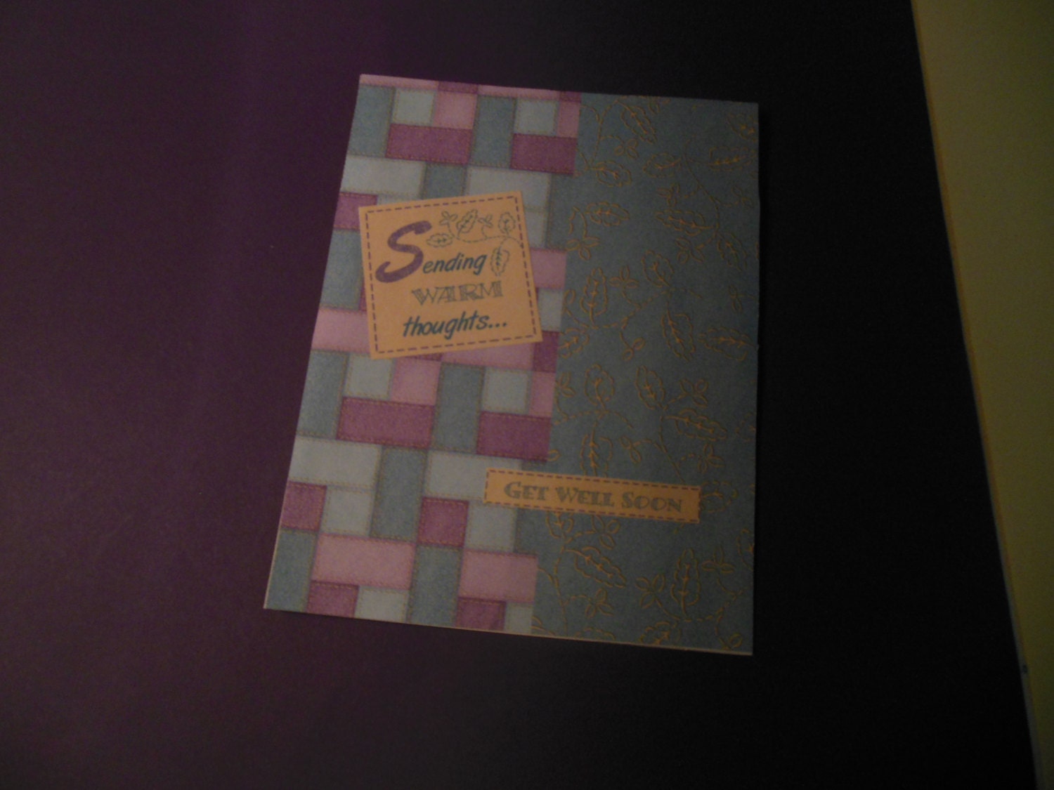 This is a hand made getwell card, purple and blue....