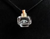 Human Eye Etched Tiny Bottle Pendant