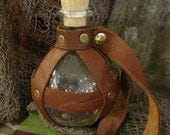 Pirate/Steampunk Glass Round Bottle, Leather-Wrapped - Made using film overstock leather from Pirates of the Caribbean