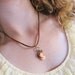 50% OFF Buttercups and Kisses Necklace - coral cameo, flower charm, and leaf charms on a brown suede cord