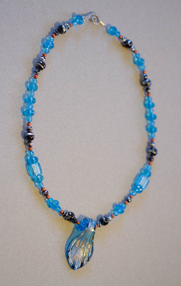 Coppery Skies: Beaded necklace with lampwork pendant