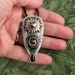 Regeneration From Within - sterling pendant with brass and pyrite cabochon sun, golden glass snake and black onyx tear drop OOAK